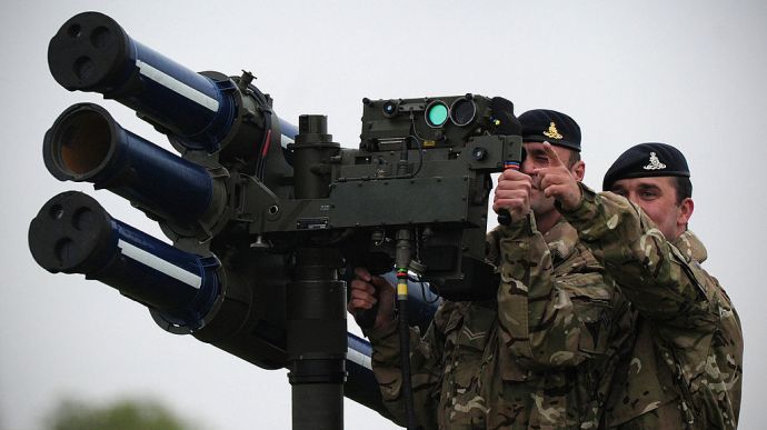 A Starstreak high velocity missile (HVM) system, which could play a role in providing air security during the Olympics, is manned by members of the British Royal Artillery during a media demonstration at Blackheath in southeast London on May 3, 2012. Britain is to rehearse its security measures for the Olympic Games this week in a military exercise involving warships, fast jets, helicopters and dummy missiles, the Ministry of Defence said. Exercise Olympic Guardian, a land, sea and air drill, will take place in three phases from May 2-10 -- the first on the south coast, the second in London's airspace and the final phase on the River Thames. AFP PHOTO/CARL COURT (Photo credit should read CARL COURT/AFP/GettyImages)